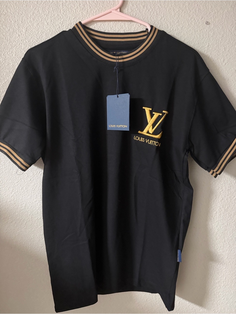 Louis Vuitton Black T-Shirt with Gold LV Logo and Striped Trim